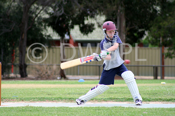 stock photo image: Australia, SA, South Australia, Sport pictures, Sports, cricket, cricket game, cricket games, cricket match, cricket matches, boy, boys, male, males, hat, hats, teenager, teenagers, teenage boy, teenage boys, adolescent, adolescents.