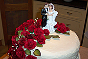 Food, cake, cakes, wedding, weddings, wedding cake, wedding cakes, icing, groom, grooms, bride, brides, rose, roses, bridegroom, bridegrooms.