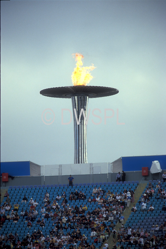 stock photo image: Australia, New South Wales, Sydney, Homebush, Homebush Bay, Olympic Park, olympic Park stadium, stadium, stadiums, arena, arenas, sports arena, sports arenas, sports stadium, sports stadiums, Sport pictures, Sports, Olympics, Olympic stadium, olympic stadiums, 2000 Olympics, Sydney Olympics, Sydney Olympics, sports ground, sports grounds, torch, torches, flame, flames, olympic flame.