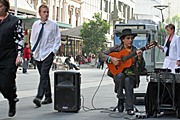Australia, vic, victoria, melbourne, tram, trams, speaker, speakers, man, men, male, males, busker, buskers, busking, guitar, guitars, music, musical instrument, musical instruments, bouke, bourke street, bourke street mall, mall, malls.