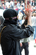 Australia, vic, victoria, melbourne, flinders street station, people, man, men, global warming, protest, protests, protestor, protestors, demonstration, demonstrations, mask, masks.