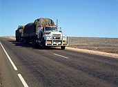 Transport, transportation, vehicle, vehicles, truck, Trucks, heavy vehicle, heavey vehicles, road train, road trains, roadtrain, roadtrains, outback, australian outback, outback australia, australia, nt, northern territory, outback, australian outback, outback australia, road, roads, sealed, sealed road, sealed roads, sign, signs.