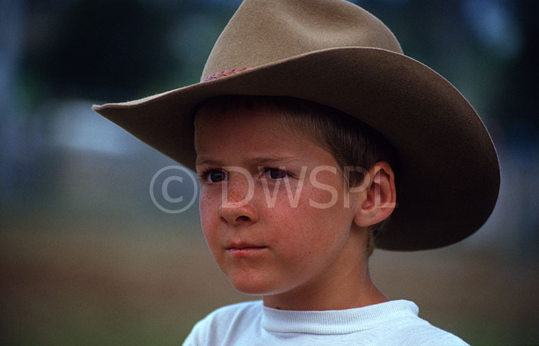 stock photo image: People, child, children, boy, boys, male, males, hat, hats, akubra, akubra hat, akubra hats, headwear, cowboy hat, cowboy hats.