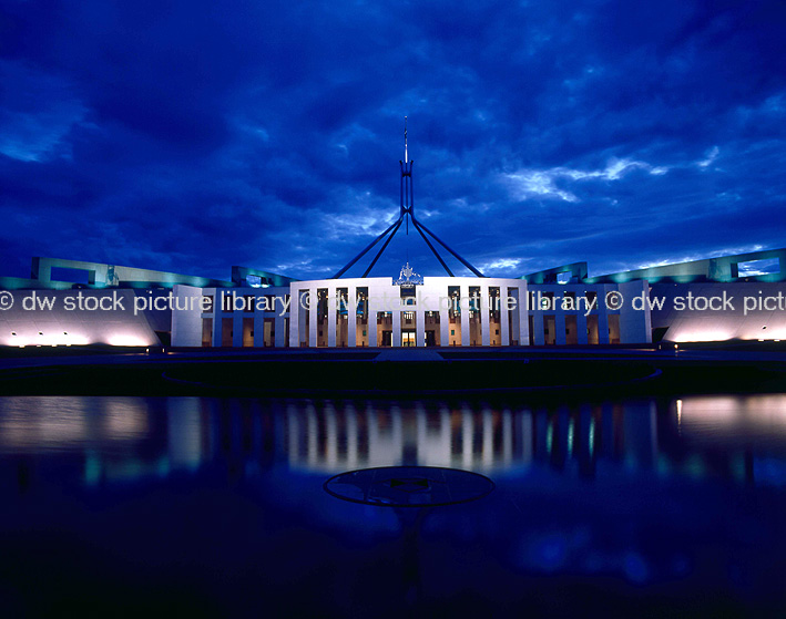 stock photo image: Australia, ACT, Australian Capital Territory, territory, territories, Canberra, great dividing range, cloud, clouds, sky, skies, blue sky, blue skies, parliament house, parliament houses, parliament, government, flag, flags, australian flag, australian flags, water, cloud, clouds, water.