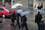 Australia, New South Wales, sydney, rain, rains, raining, wet, umbrella, umbrellas, people, pedestrian, pedestrians, road, roads, sealed, sealed road, sealed roads, transport, car, cars, men, man.