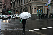Australia, New South Wales, sydney, rain, rains, raining, wet, umbrella, umbrellas, people, pedestrian, pedestrians, road, roads, sealed, sealed road, sealed roads, traffic, car, cars, transport, sign, signs.