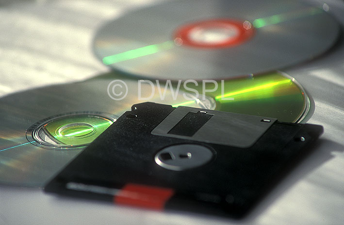 stock photo image: Consumer product, consumer products, computer, computers, disk, disks, computer disk, computer disks, floppy disk, floppy disks, compact disk, compact disks, cd, cds.