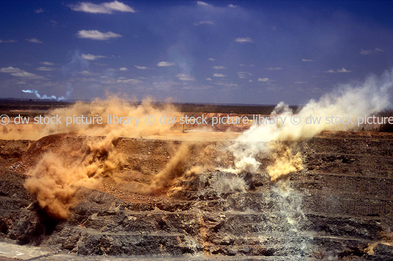 stock photo image: Australia, WA, Western Australia, mine, mines, mining, gold, goldfields, gold mine, gold mines, gold mining, superpit, superpits, Kalgoorlie, Boulder, blast, blasts, blasting, explosion, expolosions, exploding, dynamite, explosive, explosives, dust, dusty.