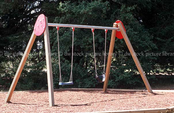 stock photo image: Swing, swings, childs swing, childrens swings, swing set, swing sets, playground, playground equipment, playgrounds, australia.