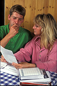 People, couple, couples, indoors, man, men, male, males, woman, women, female, females, table, tables, kitchen, kitchens, bill, bills, debt, debts, household, household bill, household bills, stress, worry, anxiety, finance, finances, financial document, financial documents, portrait, portraits, people, Australia, Sport pictures, Sports, balloon images, hot air balloons