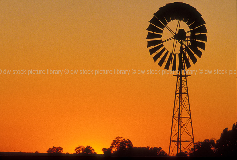 stock photo image: Farming, Farmland, farm, farms, Agriculture, Windmill, Windmills, outback, australian outback, outback australia, Australia, rural, rural scene, rural scenes, sunset, sunsets, sunrises and sunsets, WA, Western Australia, Australia.