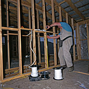 People, Man, Men, Male, Males, construction, construction site, construction sites, building site, building sites, building industry, Occupation, frame, frames, timber, Occupations, builder, builders, building industry, housing industry, house, houses, housing, tape measure, tape measures, measure, measuring, framework, indoors, australia, victoria.