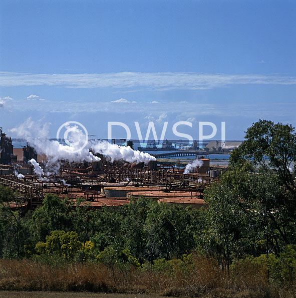 stock photo image: Australia, Qld, Queensland, Gladstone, Alumina, Alumina smelter, Alumina smelters, smelter, smelters, Aluminium production, Aluminium, Comalco, Aluminium plant, Aluminium plants, Queensland Alumina Bauxite refinery, refinery, refineries, smoke, pollution, air pollution, pollute, pollutes, polluting.