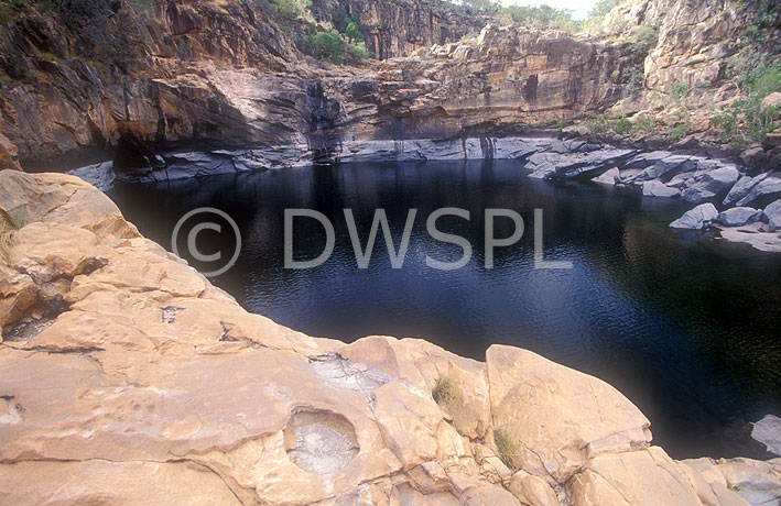 stock photo image: Australia, Kakadu, kakadu np, kakadu national park, NT, Northern Territory, koolpin, koolpin gorge, gorge, gorges, koolpin creek, National Park, National Parks, water, cliff, cliffs.