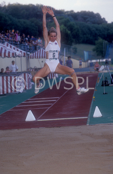 stock photo image: Australia, New South Wales, Sydney, People, female, females, fleming, Jane fleming, woman, women, Jump, jumps, longjump, longjumping, longjumper, longjumpers, long, Sport pictures, Sports, Sporting event, sporting events, athlete, athletes, competition, competitions, long jump, long jumper, long jumpers, long jumping, track and field, track and field event, track and field events, outdoors.