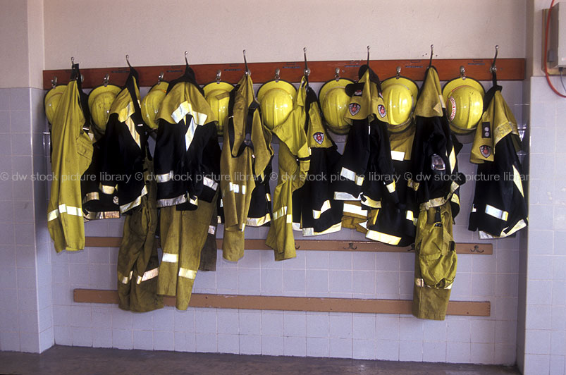 stock photo image: Fire, Fires, emergency services, disaster, disasters, australia, new South Wales, nsw, fire station, fire stations, uniform, uniforms, protective clothing, helmet, helmets, fireman, firemen, clothing, safety equipment, safety clothing.