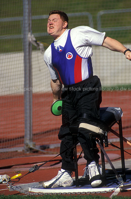 A ROYALTY FREE IMAGE OF DISABLED ATHLETE THROWING DISCUS, AUSTRALIA