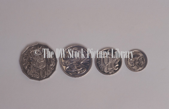 stock photo image: Coin, coins, currency, australian currency, money, australian money, australian coin, australian coins, fifty cents, twenty cents, ten cents, five cents, 50 cents, 20 cents, 10 cents, 5 cents, 85 cents, eighty five cents, eight-five cents, silver coin, silver coins, tender, legal tender, australia, australian.