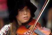 People, child, children, female, females, girl, girls, child playing musical instrument, children playing musical instruments, musical instrument, musical instruments, violin, violins, violin player, violin players, violin playing, music, outdoors, busk, busks, busking, busker, buskers, hat, hats, freckle, freckles, Australia, New South Wales, sydney, string, stringed, string instrument, string instruments, stringed instrument, stringed instruments, violinist, violinists.