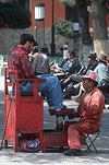 Bolivia, South America, Potosi, man, men, male, males, occupation, occupations, clean shoes, cleaning shoes, shoe shine, shoe shiner, shoe cleaner, shoe cleaners, chair, chairs.