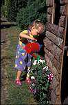 Child, children, girl, girls, female, females, garden, gardens, gardening, outdoors, leisure, watering, watering can, watering cans, flowers, Australia, Sport pictures, Sports, balloon images, hot air balloons