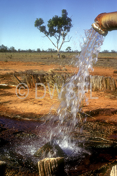 stock photo image: Australia, Australian, Australian desert, Australian deserts, Water resources, bore, bores, artesian bore, artesian bores, desert, deserts, desert scenes, australian outback, outback australia, simpson, simpson desert, water, water scene, water scenes.