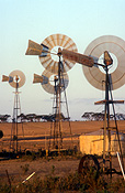 Farming, Farmland, farm, farms, Agriculture, eyre highway, nullarbor, nullarbor plains, eyre, highway, highways, rural, rural scene, rural scenes, Penong, SA, basin, basins, anjutabie basin, South Australia, Australia, windmill, windmills, power, circle, circles, circular, tank, tanks, water tank, water tanks, mood, mood scene, mood scenes.