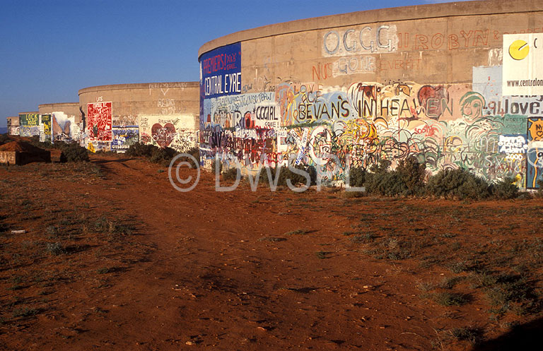 stock photo image: Graffiti, grafitti, deface, defaced, defacing, australia, vandalise, vandalism, tank, tanks, water, water storage, water tank, water tanks, port augusta, sa, south australia, australia.