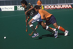 People, Australia, Sport pictures, Sports, man, men, male, males, outdoors, hockey, hockey game, hockey games, hockey stick, hockey sticks, run, runs, running, runner, runners, sign, signs, stadium, stadiums.