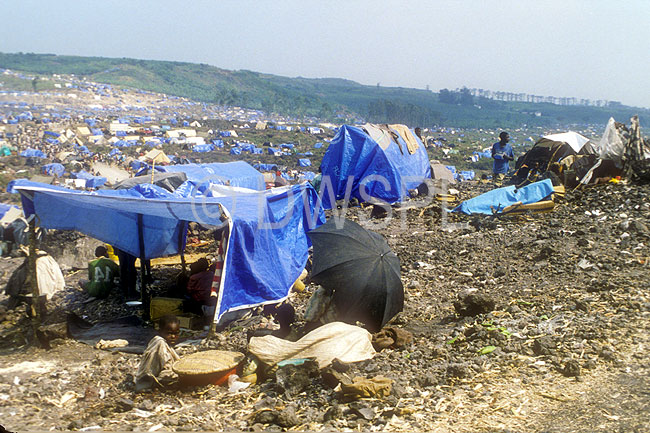 stock photo image: Africa, African, Africans, Civil War, Civil Wars, Rwanda, Rwandan, Rwandan Civil War, Rwandan Refugee Camp, Rwandan Refugee Camps, Refugee Camp, Refugee Camps, Refugee, Refugees, people, tent, tents, JRH24,