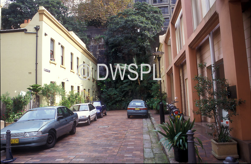 stock photo image: Australia, New South Wales, Sydney, Sydney street, Sydney streets, Atherden Street, shortest street, shortest streets, parked car, parked cars, house, houses, housing, architecture, shortest, road, roads, street, streets, car, cars, vehicle, vehicles, motorcar, motorcars, automobile, automobiles, motor vehicle, motor vehicles.