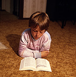 People, child, children, boy, boys, male, males, indoors, child reading, children reading, book, books, paper, read, reads, reading, book, books, paper.