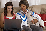 People, child, children, puberty, teenager, teenagers, adolescent, adolescents, teenage boy, teenage boys, boy, boys, girl, girls, teenage girl, teenage girls, computer, computers, dog, dogs, pet, pets, domestic, domestic dog, domestic dogs, indoors, sofa, sofas, couch, couches, Australia, Sport pictures, Sports, balloon images, hot air balloons