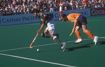 People, Australia, Sport pictures, Sports, man, men, male, males, outdoors, hockey, hockey game, hockey games, hockey stick, hockey sticks, run, runs, running, runner, runners, sign, signs, stadium, stadiums.
