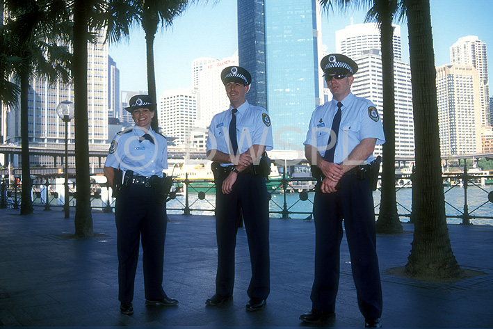 stock photo image: Australia, sydney, new South Wales, nsw, police, policeman, policemen, policewoman, policewomen, police force, law, law enforcer, law enforcement, law and order, tie, ties, uniform, uniforms, man, men, male, males, woman, women, female, females, hat, hats.