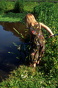 People, child, children, girl, girls, female, females, water, pond, ponds, fishing, net, nets, tadpole, tadpoles, frog, frogs, amphibian, amphibians, AM04,