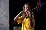 People, child, children, female, females, girl, girls, child playing musical instrument, children playing musical instruments, musical instrument, musical instruments, violin, violins, violin player, violin players, violin playing, music, string, stringed, string instrument, string instruments, stringed instrument, stringed instruments, indoors, violinist, violinists, busker, buskers, busking,