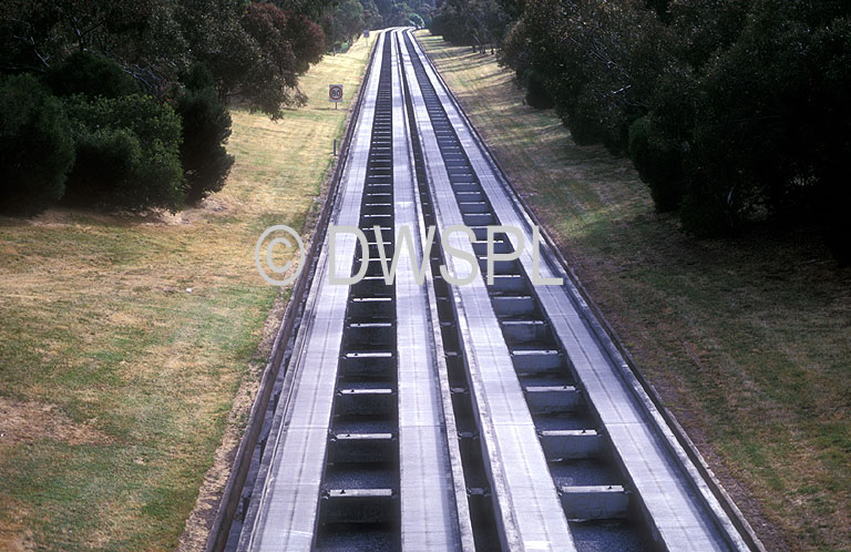 stock photo image: Australia, transport, transportation, vehicle, vehicles, bus, Buses, o-bahn, obahn, Adelaide, SA, South Australia, australia, obahns, adelaide o-bahn, busway, busways, guided busway, guided busways, track, tracks.