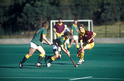 Australia, Sport pictures, Sports, hockey, hockey game, hockey games, man, men, male, males, outdoors, goal post, goal posts, goalpost, goalposts, run, runs, running, runner, runners.