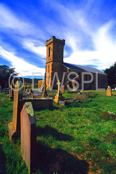 stock photo image: Australia, Tasmania, Tassie, Tas, Oatlands, church, churches, religious building, religious buildings, religion, saint peters, st peters, st peters anglican church, grave, graves, graveyard, graveyards, grave yard, grave yards, cemetery, cemeteries, headstone, headstones, head stone, head stones, gravestone, gravestones, grave stone, grave stones, tombstone, tombstones, tomb stone, tomb stones, burial, burials, burial ground, burial grounds, death, deaths, cloud, clouds.