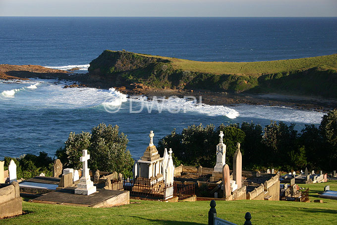 stock photo image: Australia, New South Wales, gerringong, gerringong cemetery, coast, coasts, coastal, coastline, coastlines, grave, graves, graveyard, graveyards, grave yard, grave yards, cemetery, cemeteries, headstone, headstones, head stone, head stones, gravestone, gravestones, grave stone, grave stones, tombstone, tombstones, tomb stone, tomb stones, burial, burials, burial ground, burial grounds, death, deaths, cross, crosses.