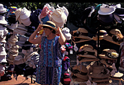 Australia, qld, queensland, eumundi, eumundi market, eumundi markets, market, markets, stall, stalls, market stall, market stalls, people, hat, hats, woman, women, female, females, label, labels.