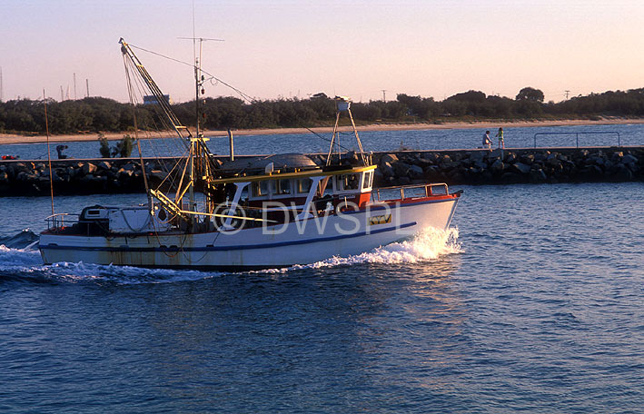 stock photo image: Australia, qld, queensland, mooloolaba, boat, boats, boating, vehicle, vehicles, fishing, fishing industry, fishing boat, fishing boats, industry, commercial, commercial fishing, trawler, trawlers, fishing trawler, fishing trawlers, breakwater, breakwaters, sea, seas, ocean, oceans, water, water scene, water scenes, breakwater, breakwaters.