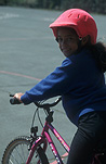 People, child, children, female, females, girl, girls, child riding bicycle, bicycles, children riding bicycles, bicycle, bicycles, transport, transportation, vehicle, vehicles, bike, bikes, cycle, cycles, cycling, bike riding, bicycle riding, helmet, helmets, child safety, bicycle helmet, bicycle helmets, bike helmet, bike helmets, safety gear, Australia, Sport pictures, Sports, balloon images, hot air balloons