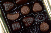 Food, sweet, sweets, chocolate, chocolates, box, boxes, candy, candies, box of chocolates, boxes of chocolates, packaging.