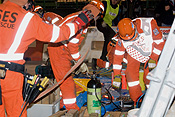 Australia, SA, South Australia, Emergency, Emergencies, Emergency service, Emergency services, SES, Rescue, Rescue Services, Accident, Accidents, vehicle, Car, Car accident, Car accidents, man, men, male, males, occupation, occupations, outdoors, uniform, uniforms, helmet, helmets, safety.